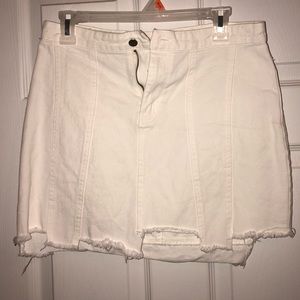 White asymmetrical hem jean skirt